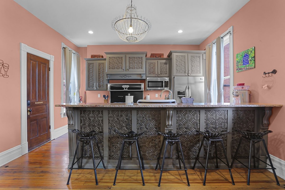 Large fully equipped kitchen with plenty of storage and a gas stove